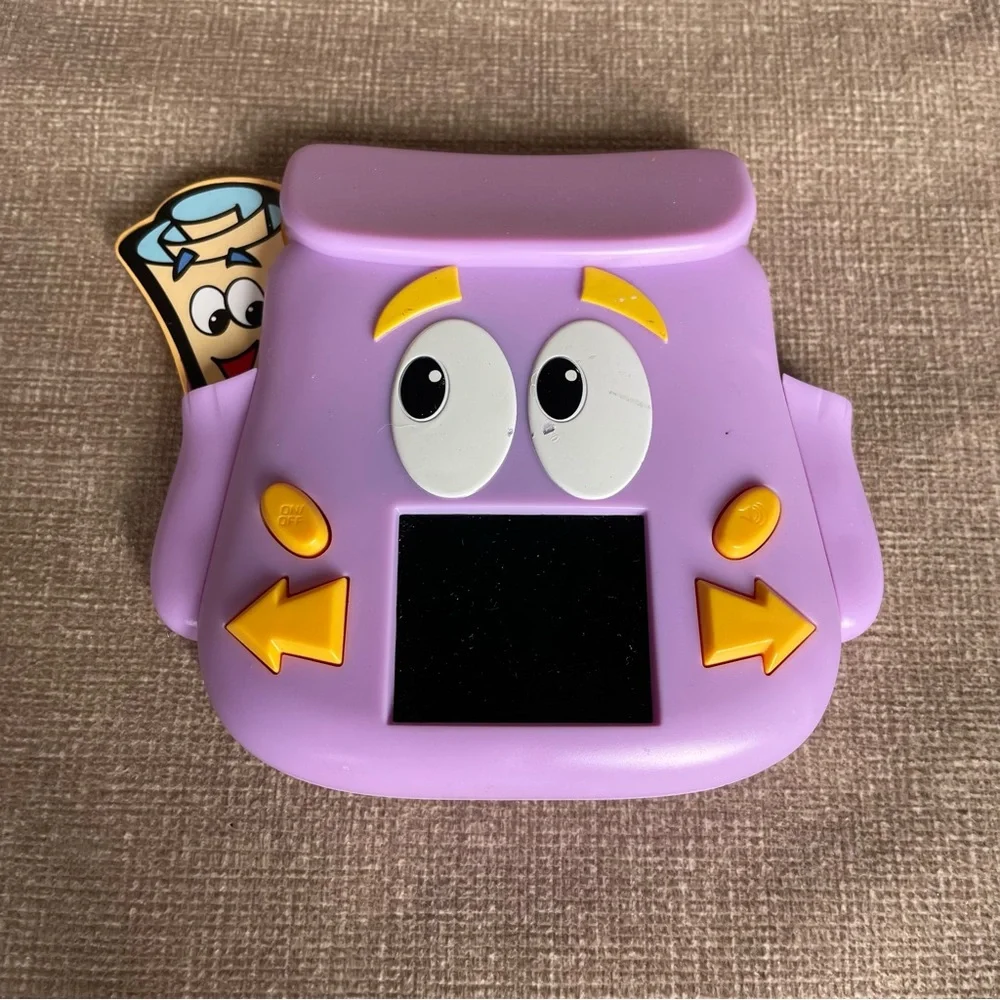 2010 technosource Dora the explorer Dora’s backpack adventure handheld LCD game